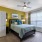 large window brightens bedroom